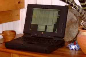laptop on a chest of drawers